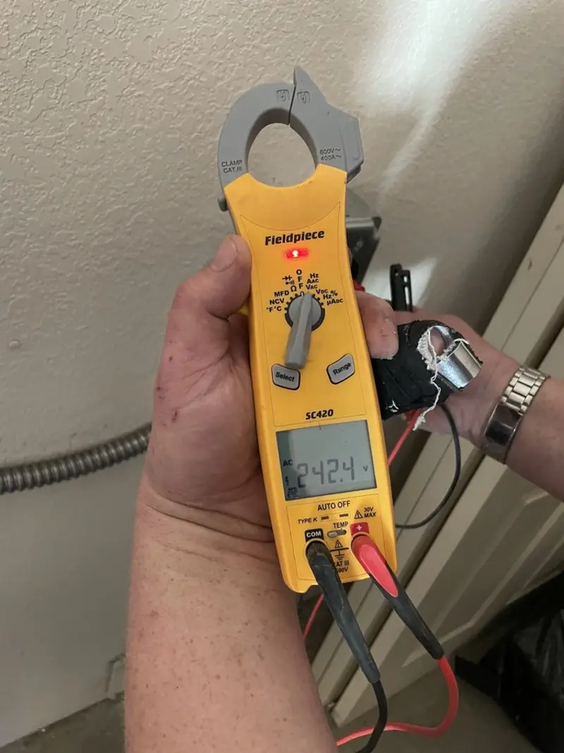 Voltage testing with clamp meter during Outlet Installation in Wilkes-Barre